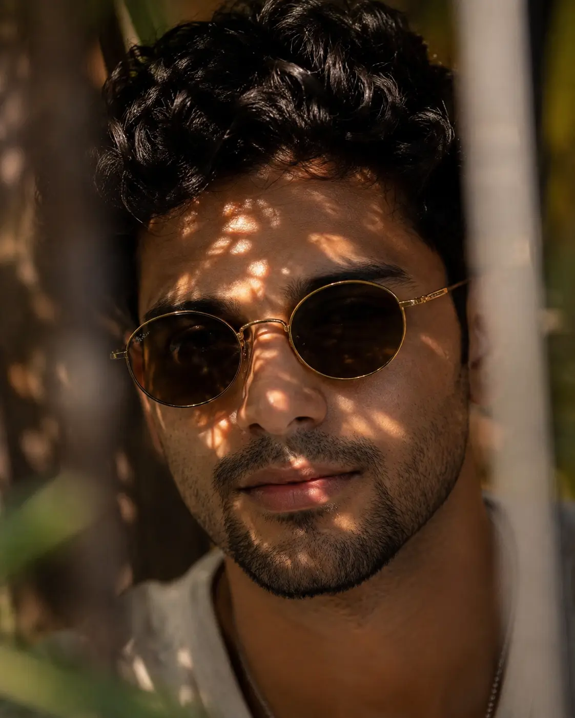 Leaf Shadow Portrait with Vintage Round Sunglasses
