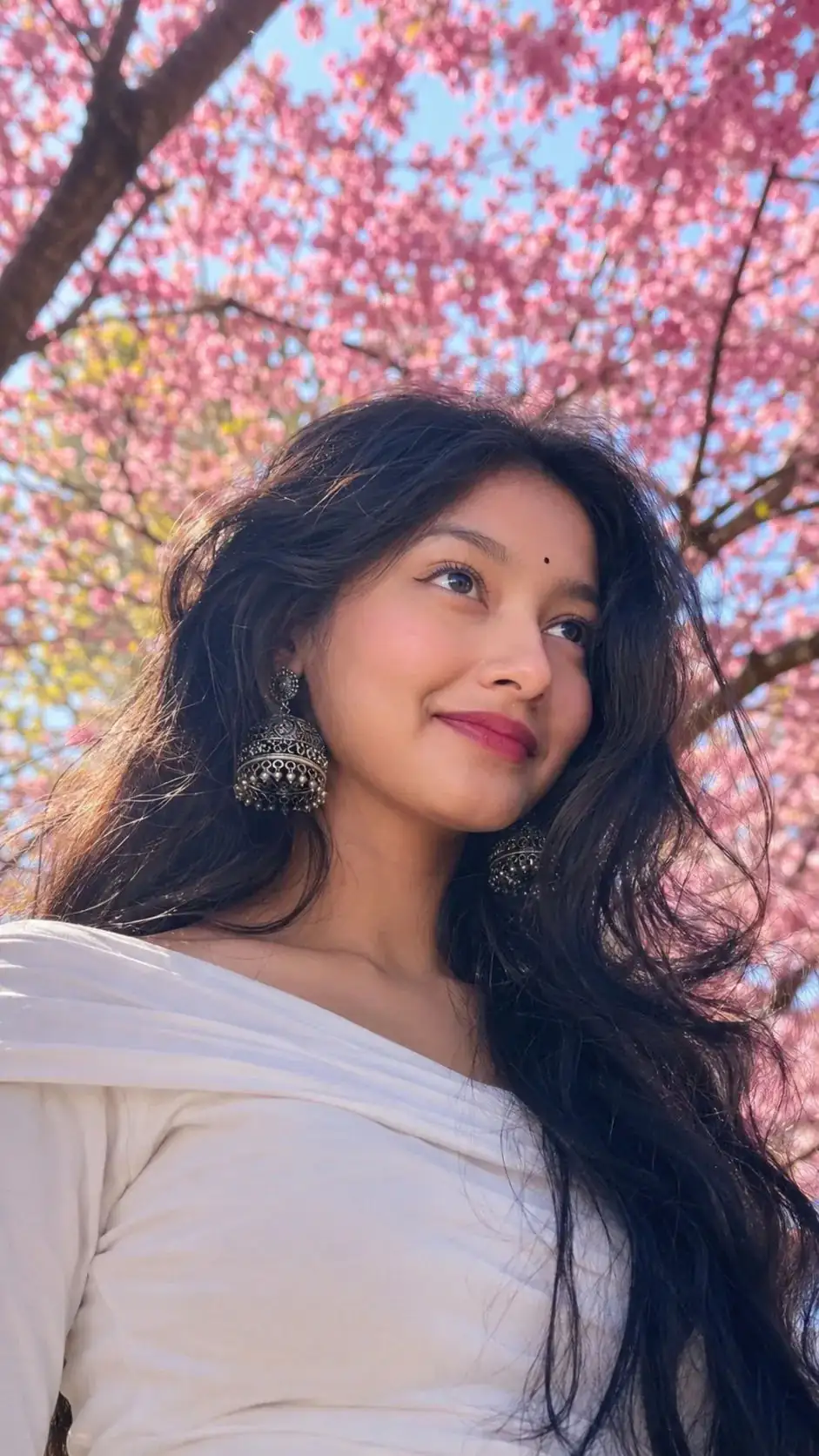 Cinematic Bengali Portrait Under Cherry Blossoms