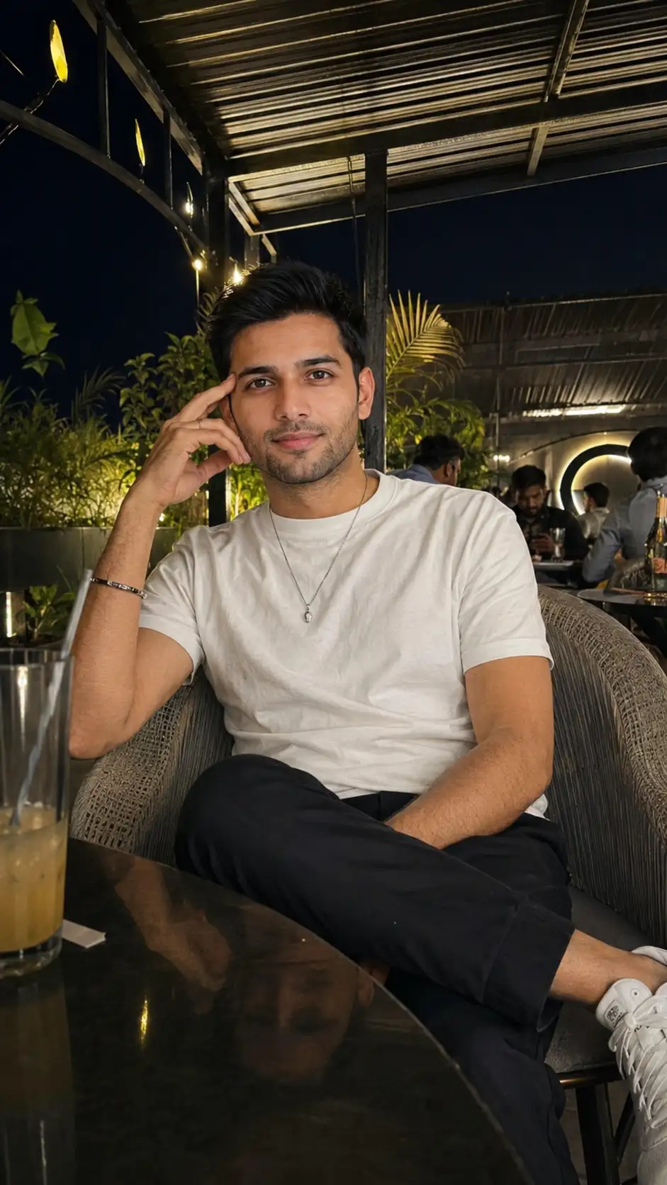Ultra-Realistic Nighttime Rooftop Café iPhone 16 Pro Max Portrait